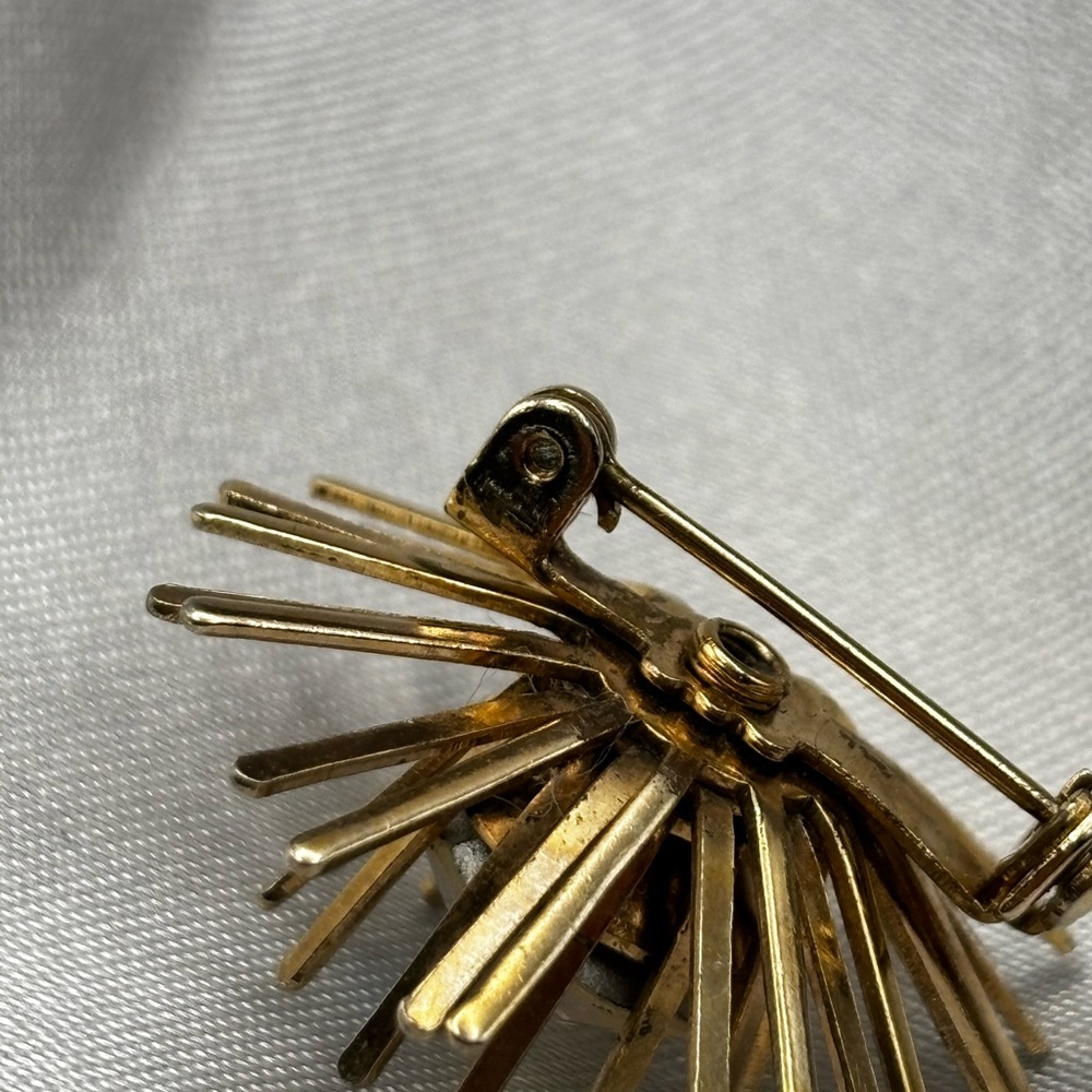 Vintage MCM Gold Tone Starburst Brooch | Aurora Borealis Crystal Center - Picture 9 of 10